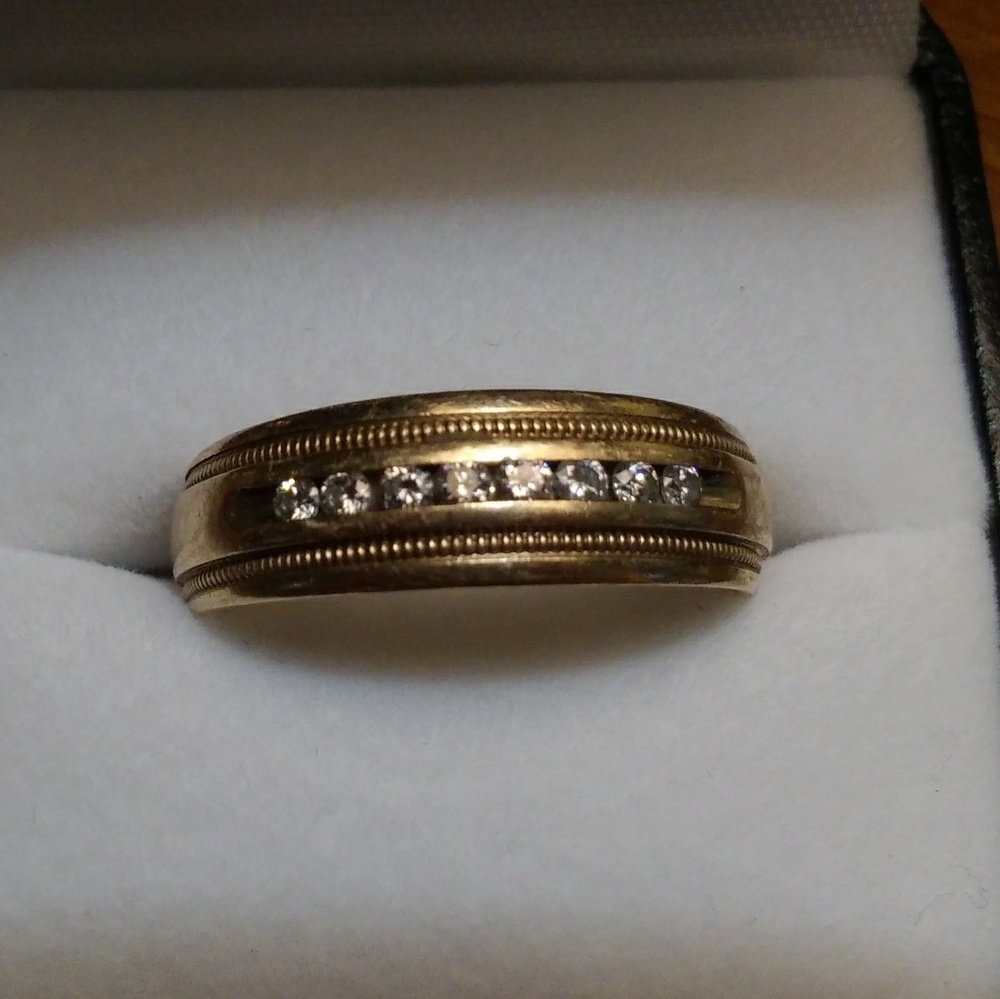 14kt engagement man ring  with diamond.